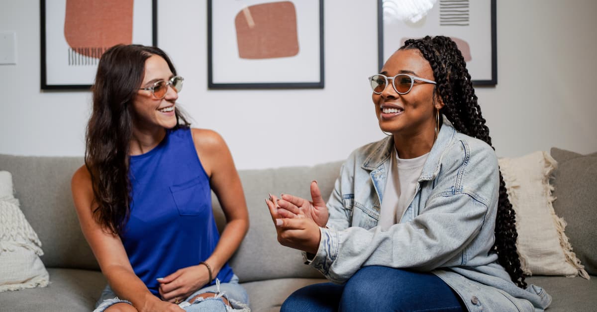 Two Women Wearing Avulux Glasses