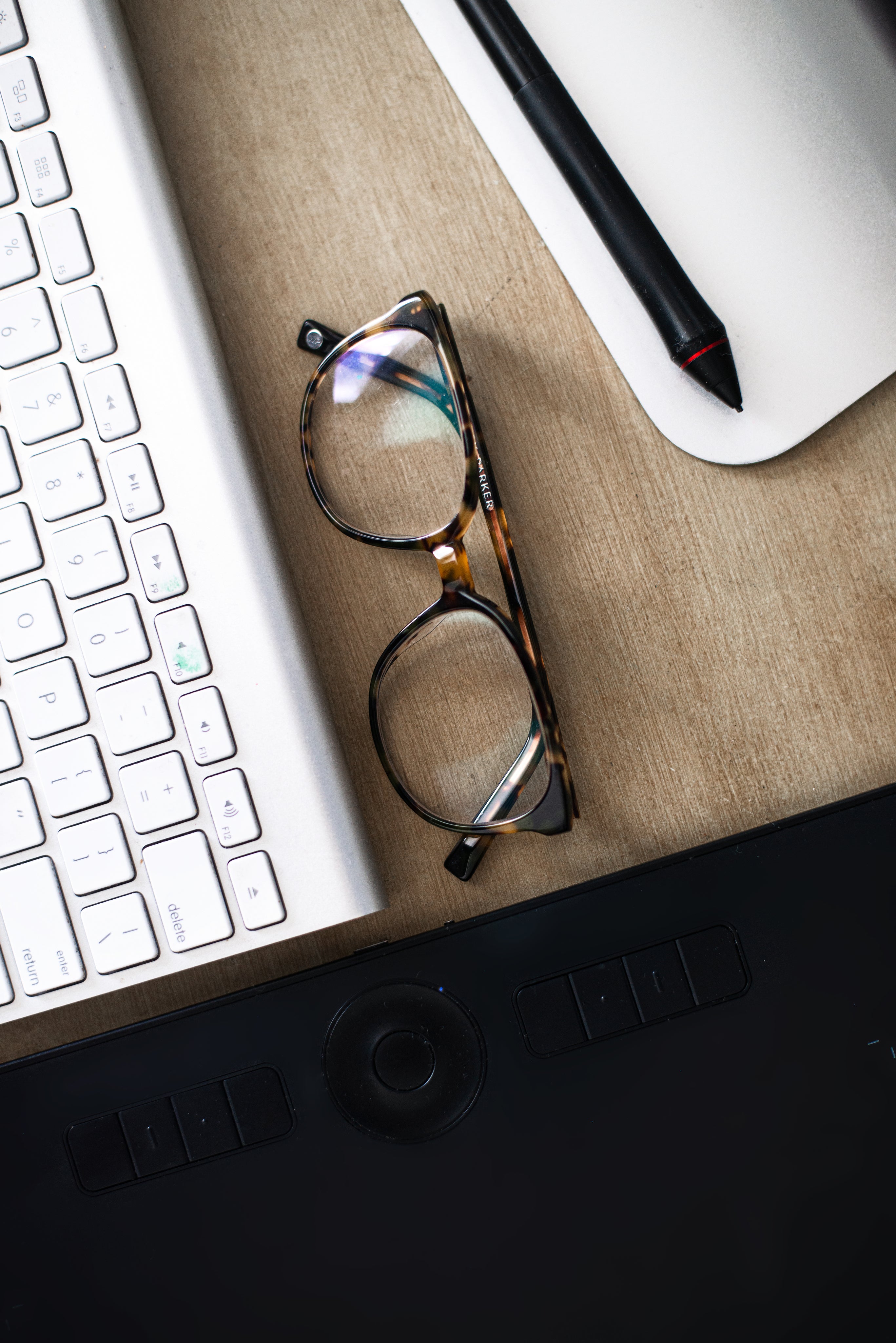 Blue light blockers near keyboard